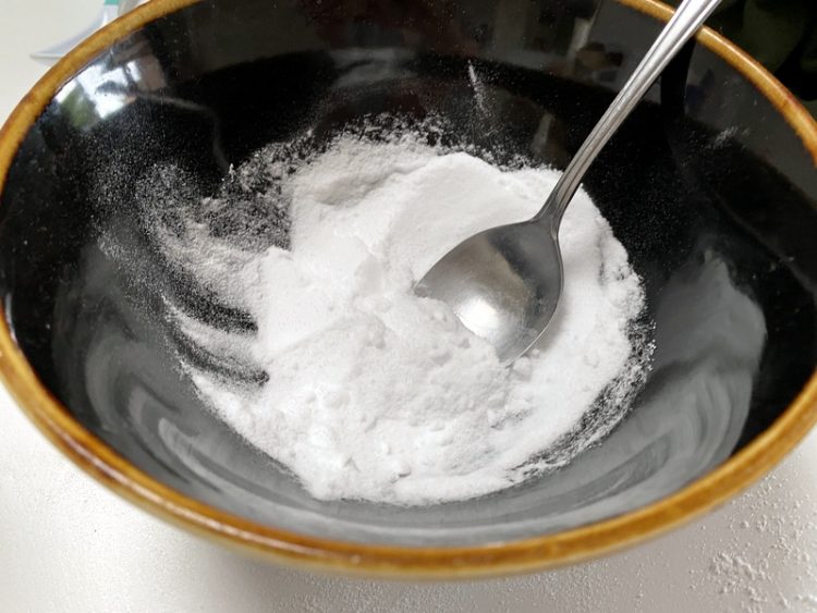 mixing dry ingredients for homemade shower steamers