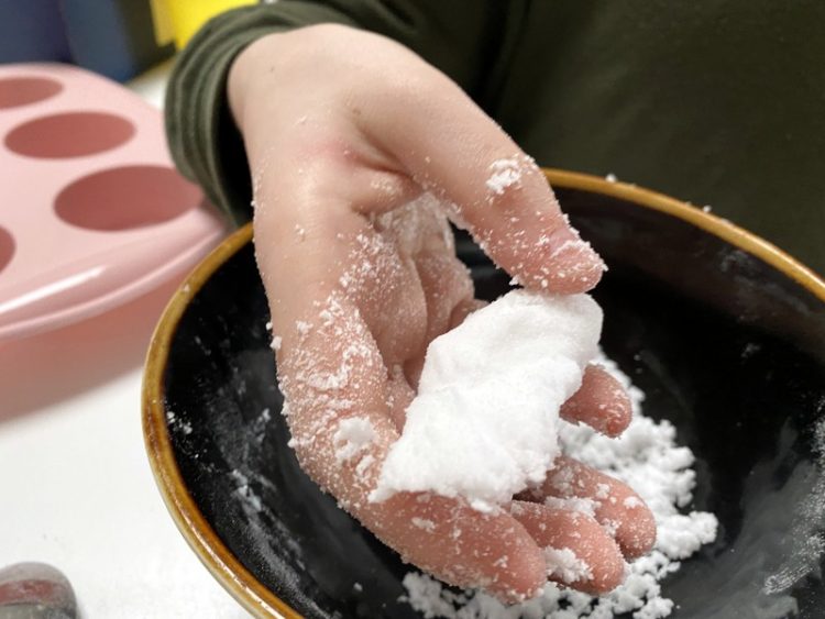 shower steamer mixture in hand