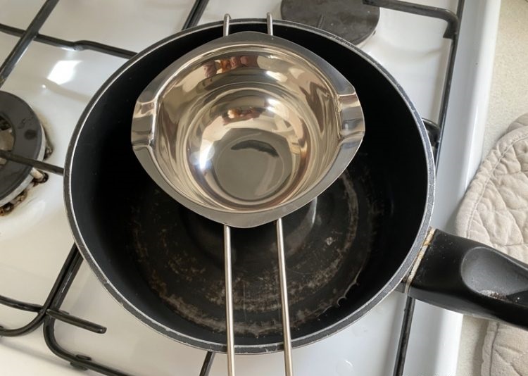 using double boiler to make lip balm