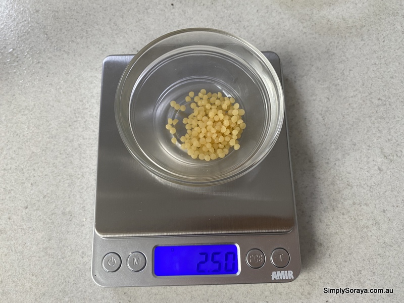 Weighing beeswax